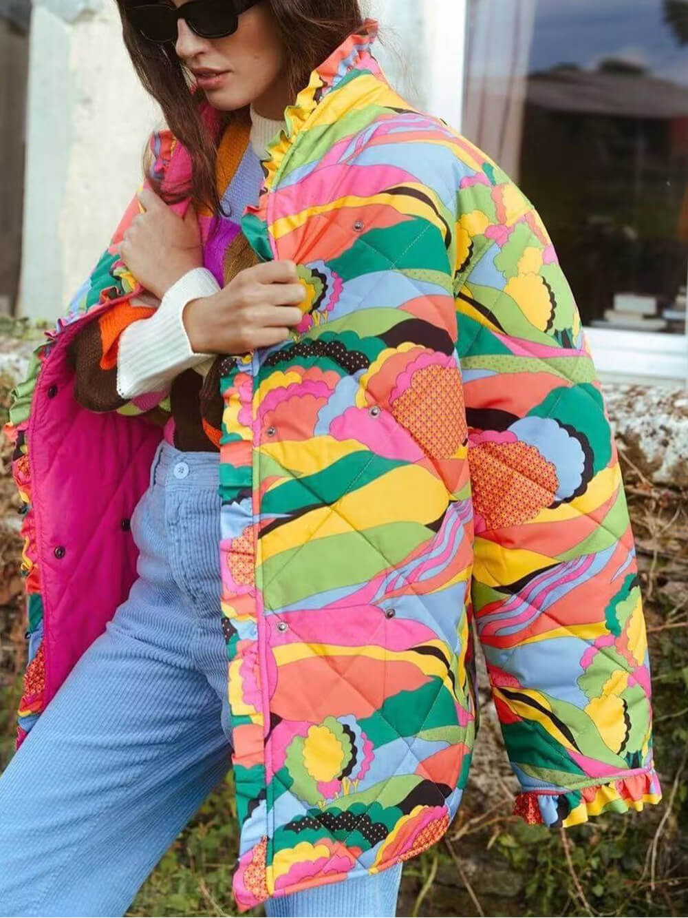 Geplooide jas met kantafwerking