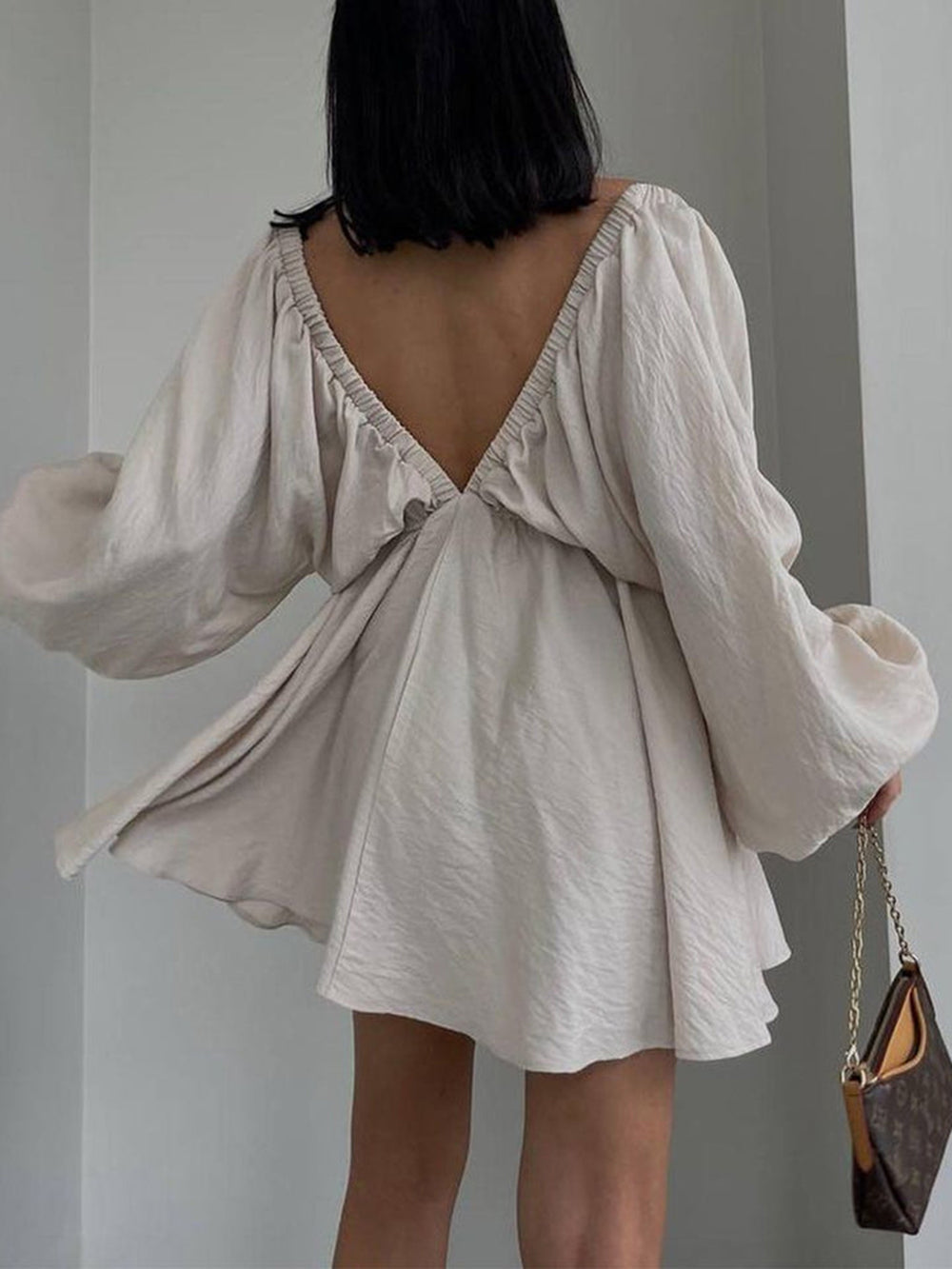 Mini skater jurk van stof met diepe halslijn